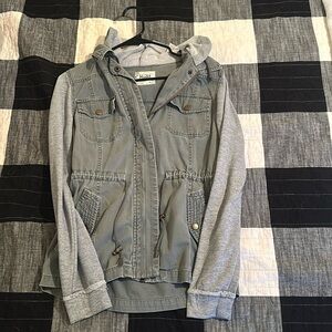 Army green hooded jacket.